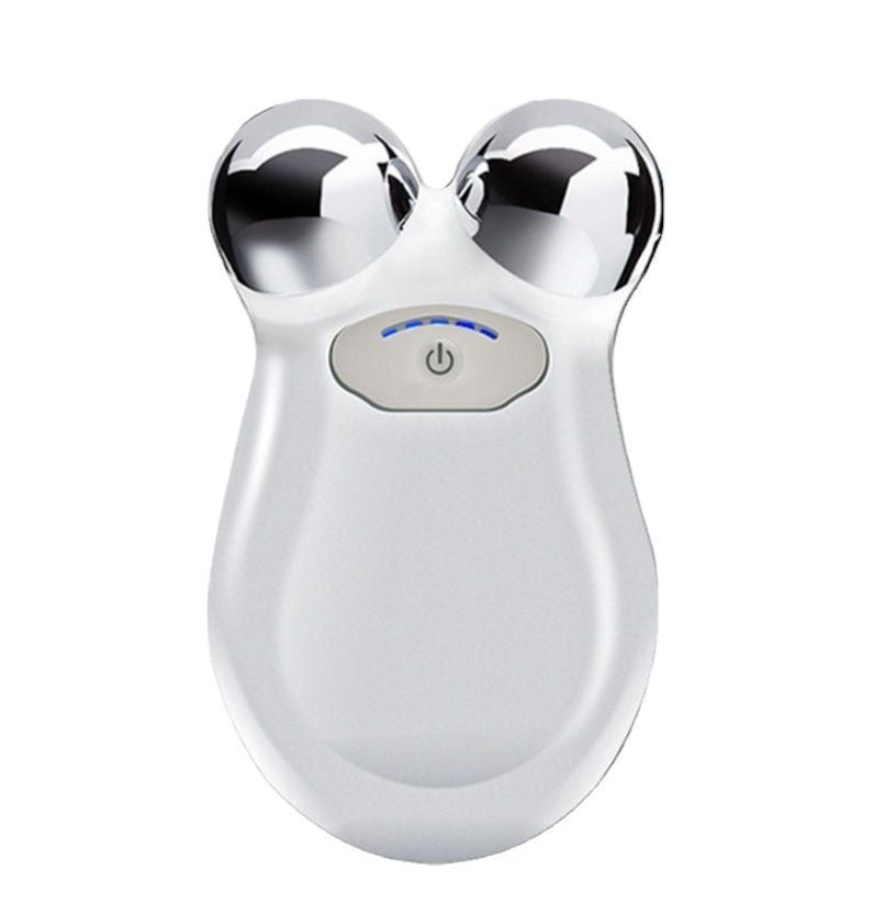 White microcurrent facial toning massager front view
