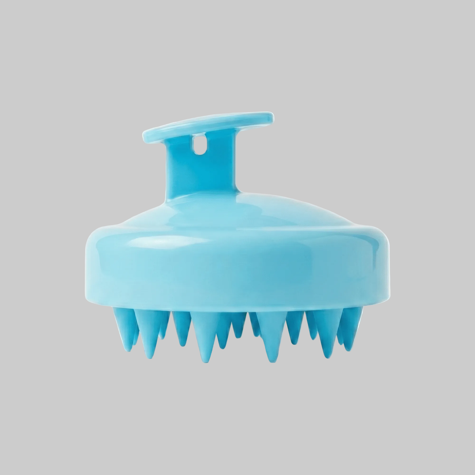 Blue silicone scalp massager brush side view